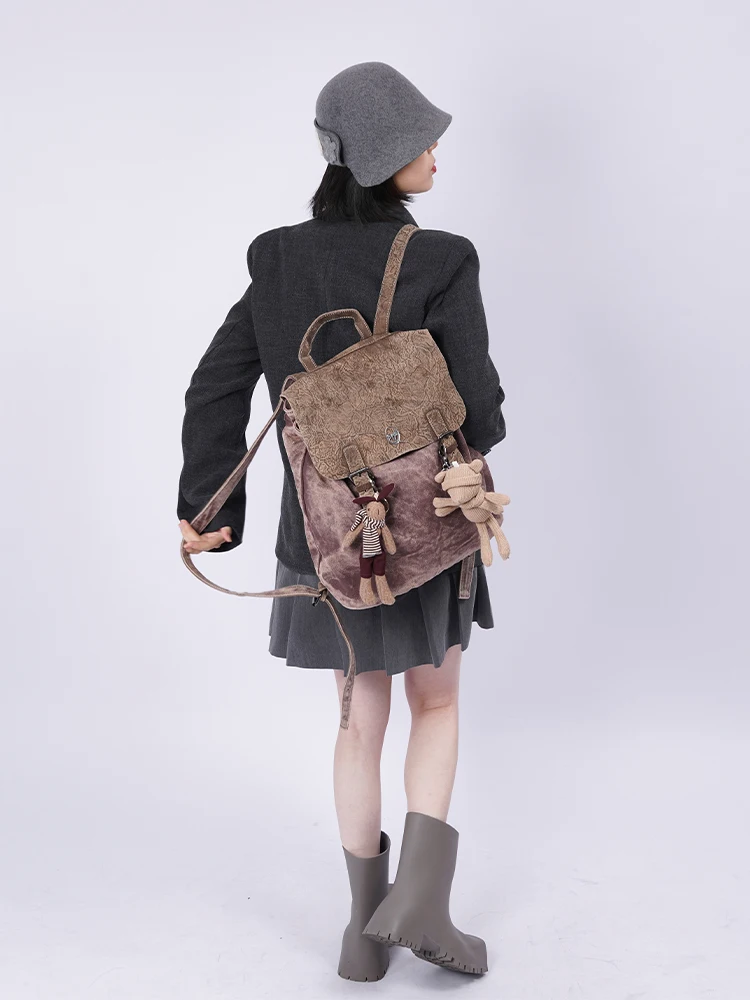 

Retro backpack, large-capacity splicing stray schoolbag.