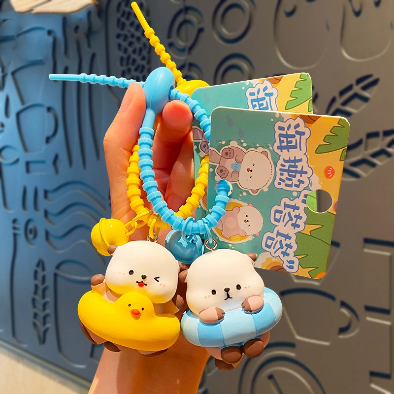 Cartoon Sea Otter Doll Keychain Kawaii Swimming Circle Sea Otter PVC Key Chains For Women Men Bag Charms Keyring Gift