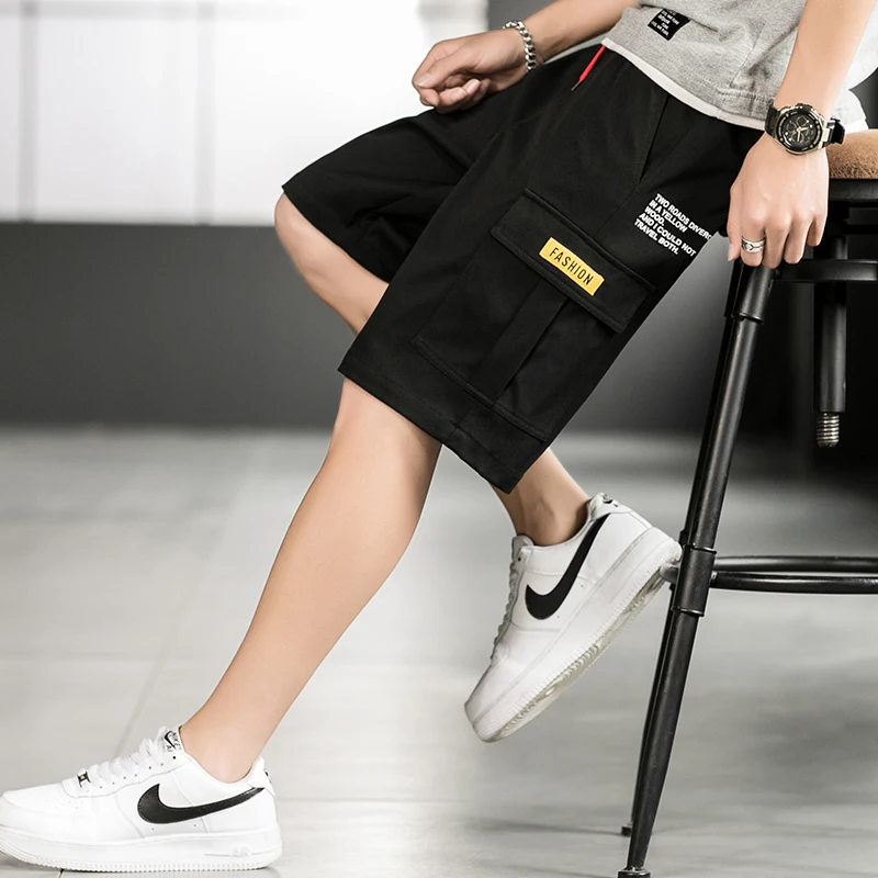 شورت ملابس العمل للرجال مع حزام خصر مطاطي كاجوال وتصميم برباط، يتميز بحزام خصر كبير ومطاط كلاسيكي