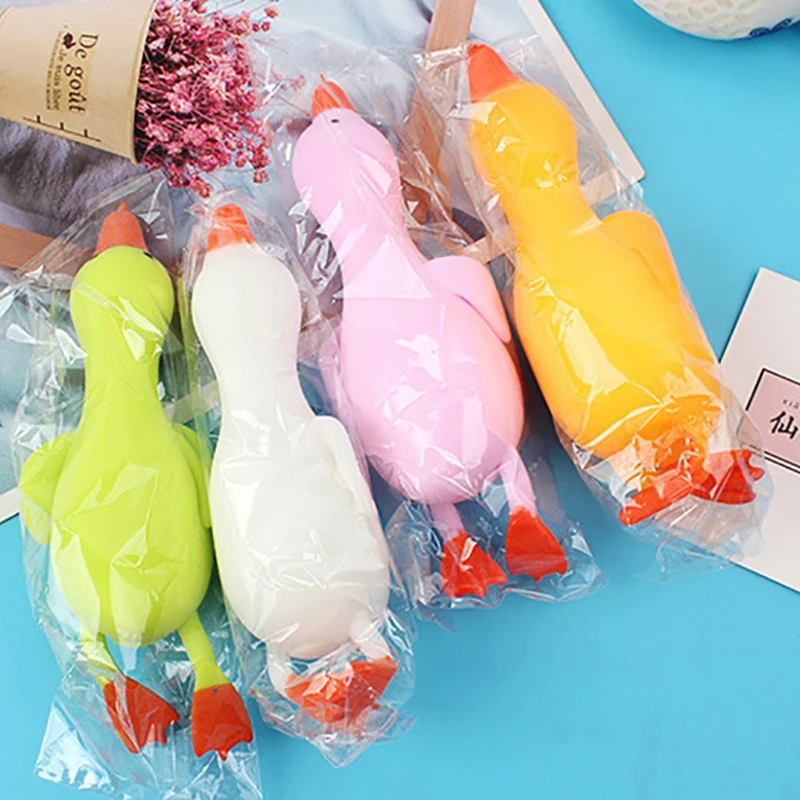 1PC Creative สีสุ่มรูปร่างเป็ดของเล่น BOUNCE และ Decompression Big White Goose การ์ตูนรูปร่างของเล่นบรรเทาความดัน