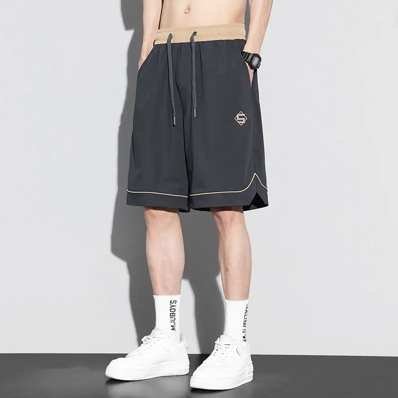 

Мужские летние спортивные штаны Ice Silk Five-Quarter, свободные легкие повседневные брюки Qui Dry, дышащие молодежные брюки из полиэфирного волокна...