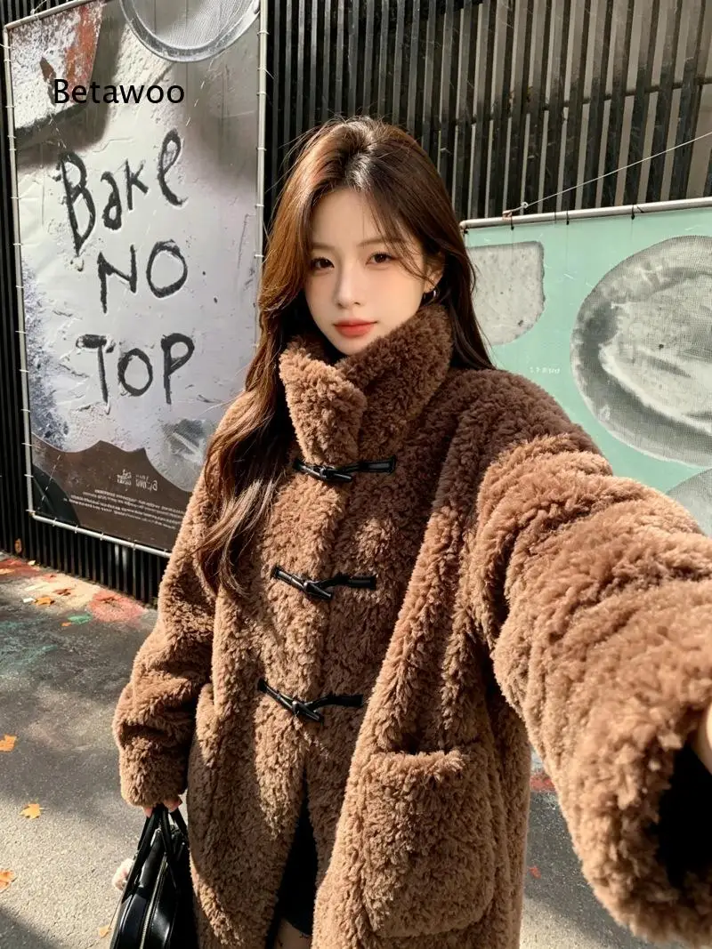 Womens mid length sheep wool faux fur overcoat horn button closure integrated fur design soft warm outerwear fashionable coat