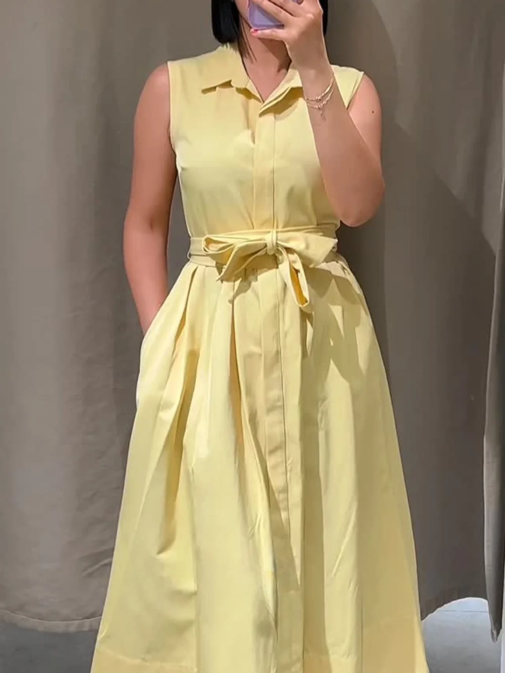

Elegant Sleeveless Yellow Shirt Dress Women Lapel Button Lace-up Pleated Long Skirt 2025 Summer Fashion Ladies Commuter Dress