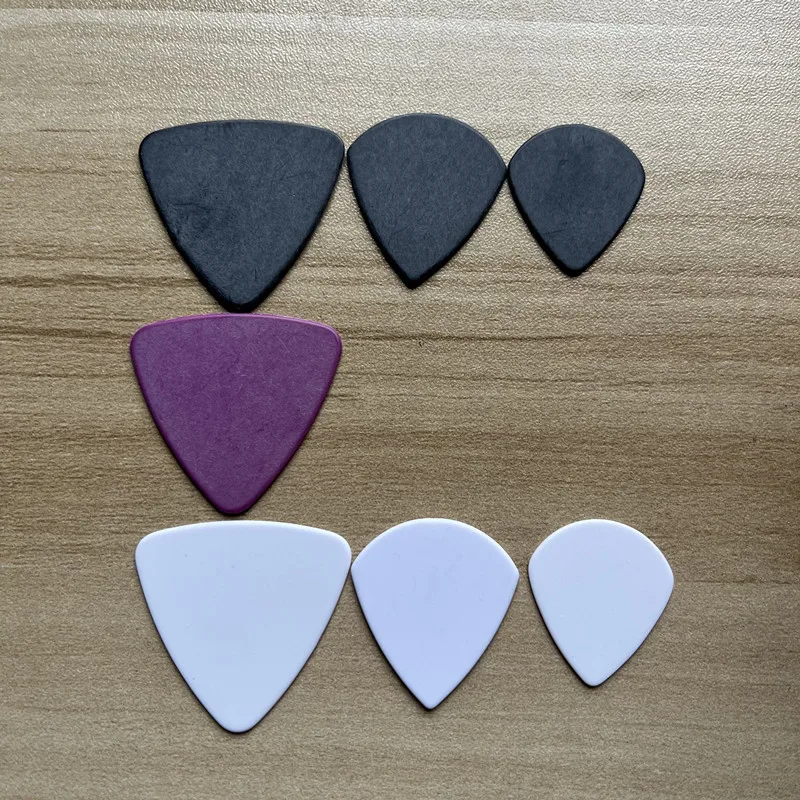 100 Stück Delrin-Gitarrenplektren JAZZ III JAZZ XL Dreieckige Form Schärfere Spitze Matt-Finish Ohne Logo Dreieckige Gitarrenplektren – Detail 4