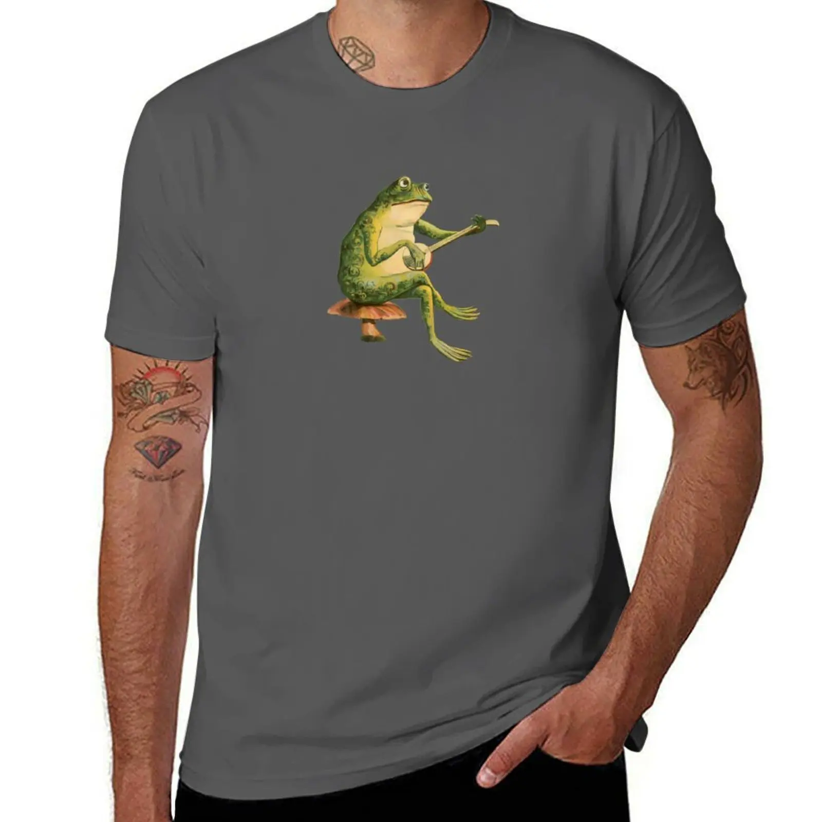 

Melancholic Vintage Frog Playing Banjo on Mushroom Toadstool - Cottagecore Toad Banjo Player - Goblincore Animal Play Gu T-Shirt