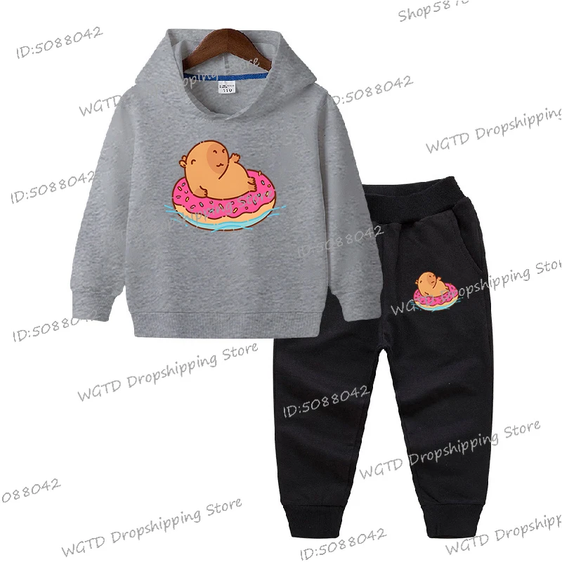 Simpatico capibara galleggiante in una ciambella Stampa Bambini Ragazzi Ragazze Felpe con cappuccio Abito Capybaras 2 pezzi Felpe con cappuccio Pantaloni Abito Kawaii Cartoon Design