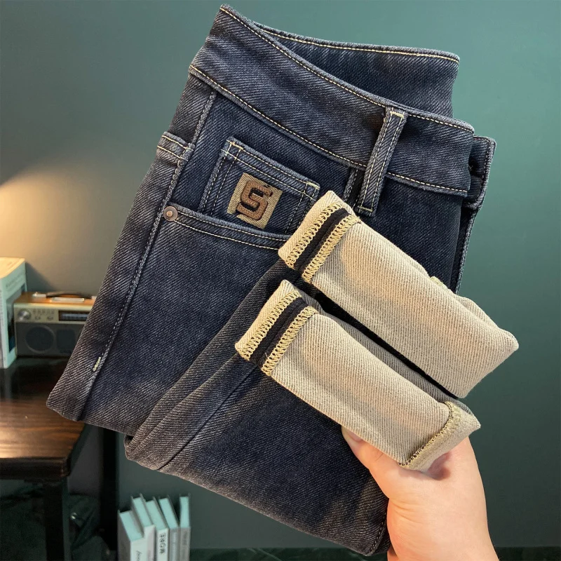 Warm and fleece jeans for men, 2025 new cold resistant men's clothing, elastic slim fit, small feet, brushed thin fleece pants