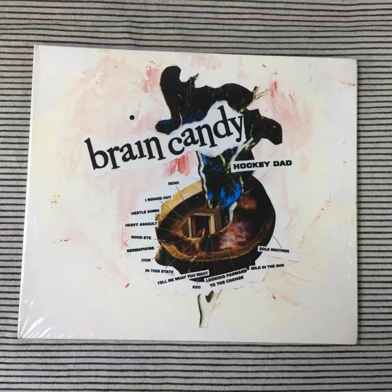 

CD Brain Candy, компакт-диск The Third Studio от австралийского инди-рок Duo Hockey Dad.released на 29 мая, 2020 г.