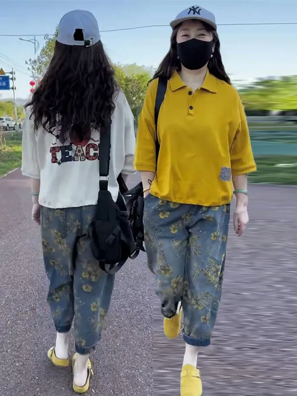 

Summer 2025 New Letter Print ort Sve T-irt Top plus Faion Printed Waed Denim Harlan Pants Two-Piece Set Women's Wear