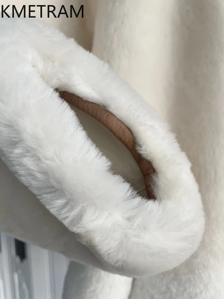 سترة من صوف ميرينو الطبيعي لعام 100% من جلد الغنم مزدوجة الوجه معطف نسائي فضفاض من الفرو الحقيقي ملابس شتوية للسيدات 2025