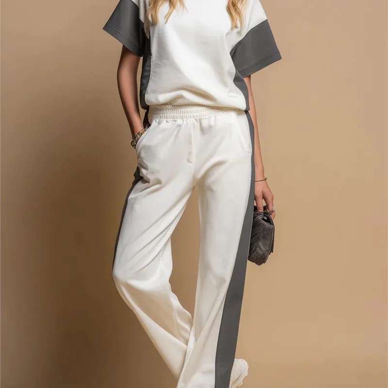 

Новый модный спортивный комплект из двух предметов: широкие брюки с контрастными вставками и свитшот с круглым вырезом и короткими рукавами для женщин, летний повседневный комплект.