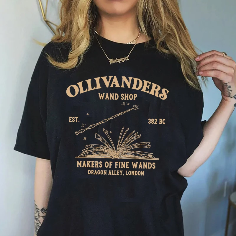 Ollivanders-wand shopウィザードブックショップTシャツ、ユニバーサルトリップブックnerdグラフィックTシャツ、半袖、カジュアルTシャツ