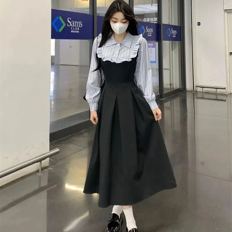 Abito camicia a righe snellente Stile falso in due pezzi Tendenza universitaria che asciuga l'età Autunno Inverno Moda internazionale transfrontaliera