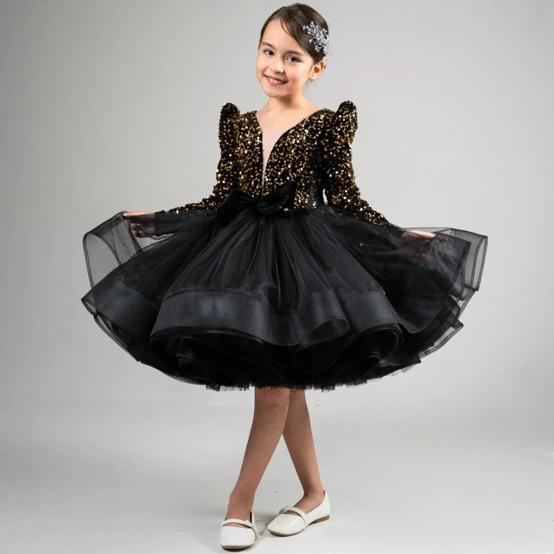 

Custom flower girl dress with a fluffy tulle skirt, sequin embellishments, bow detail, long sleeves, suitable for weddings, banq
