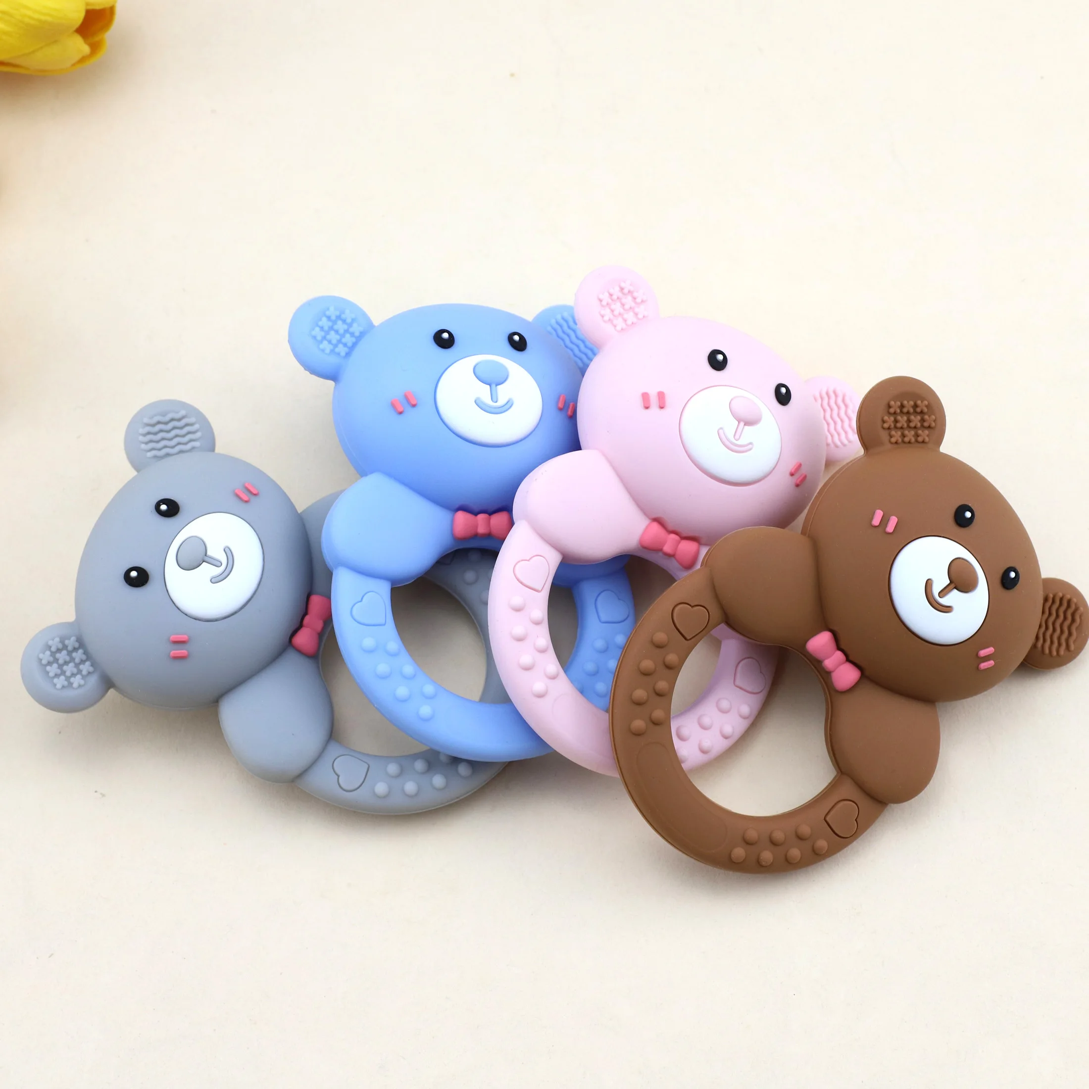 Nowy silikonowy gryzak w kształcie misia z dzwoneczkiem dla niemowląt
