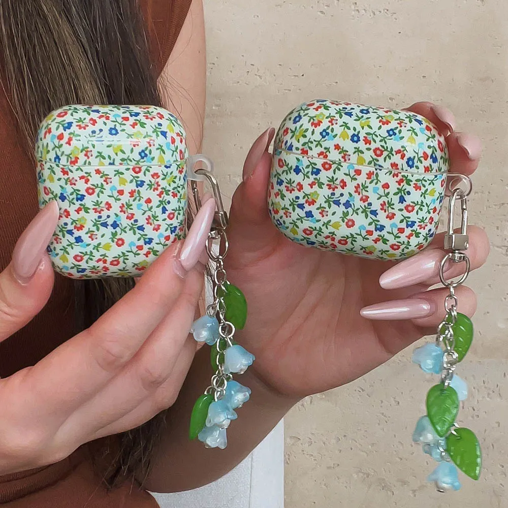 حافظة جميلة فنية صغيرة على شكل زهور لأجهزة AirPods Pro3 سلسلة مفاتيح رنين الرياح غطاء ناعم لأجهزة AirPods 4 2 3 Pro 2 غطاء ناعم #1