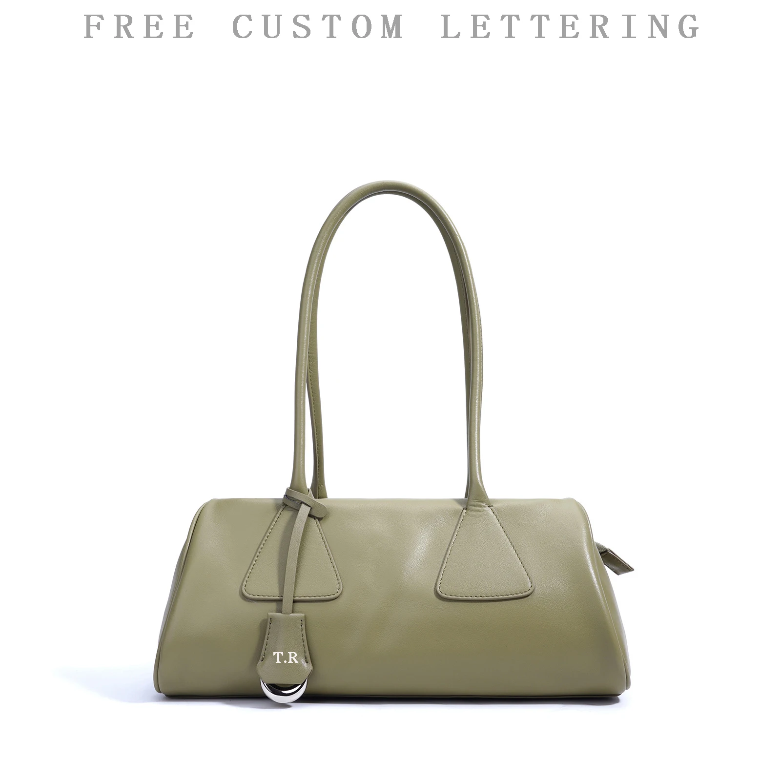 

Genuine leather women's handbag 2025 new niche design triangle pillow bag free initials French simple top leather shoulder bag