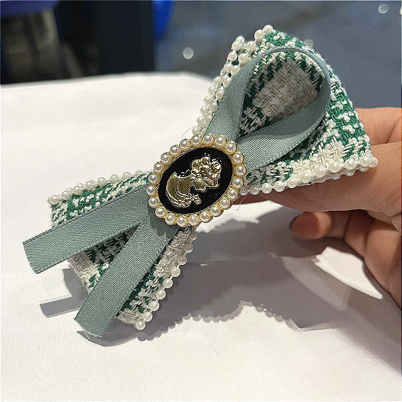 Fashion New Unique Hair Accessories Beauty Head Banana Clip with Bow Tie for Women Gorgeous Look Back Spoon Ponytail Perfect