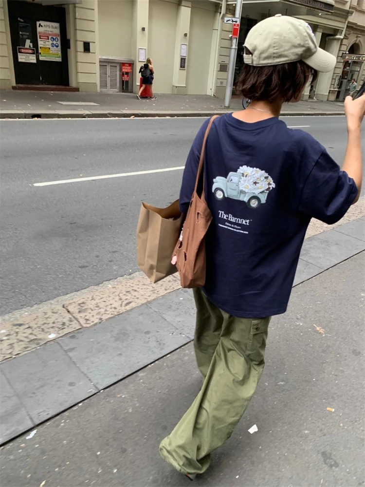 تي شيرت كلاسيكي بسيط بأكمام قصيرة مزين بالزهور للنساء فضفاض من القطن على الطراز الكوري برقبة دائرية وطول متوسط ​​للصيف