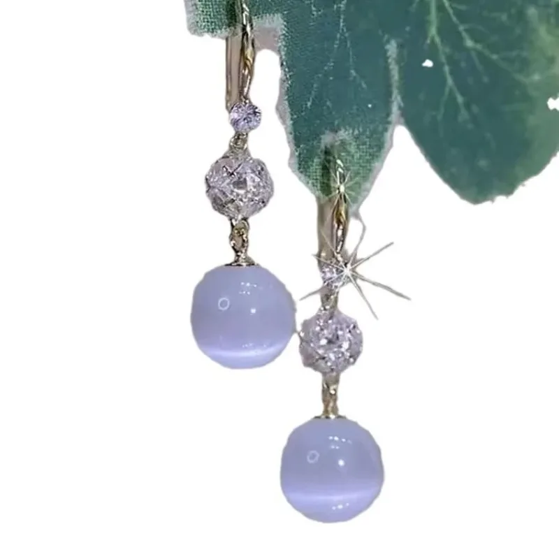 أقراط طويلة على شكل كرة أوبال 2026 أقراط عصرية جديدة على الطراز الأجنبي أقراط كلاسيكية فاخرة وخفيفة الوزن #5