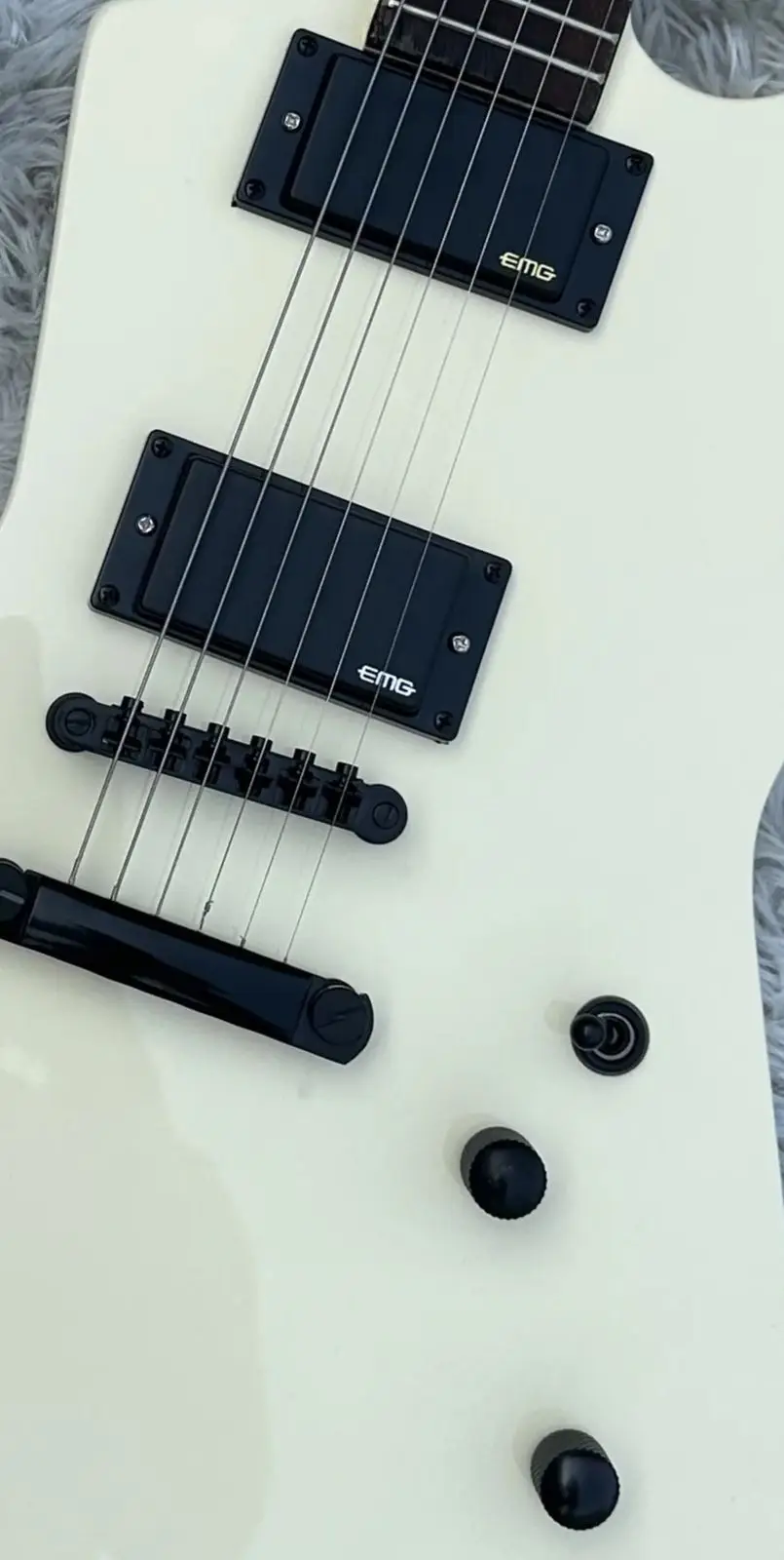 

Shaped Electric guitar, milky white, EMG active pickup, black accessories, available in stock, quick package