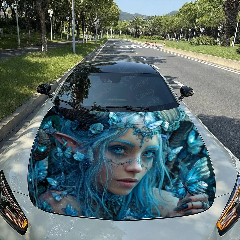 This enchanting car hood wrap features a mystical blue fairy adorned with flowers and butterflies, creating a magical and ethere