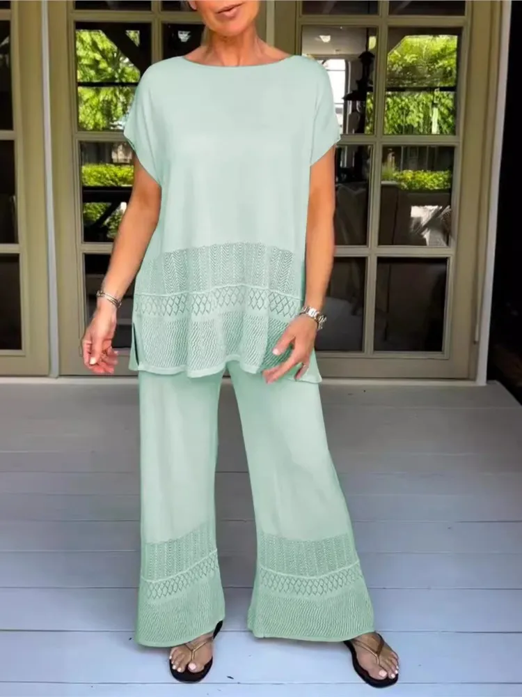 

Solid Color Round Neck Short Sleeve Two-piece Set 2026 New Women's Casual Fashion Suit Hollow Top Loose Elastic Pants Suit
