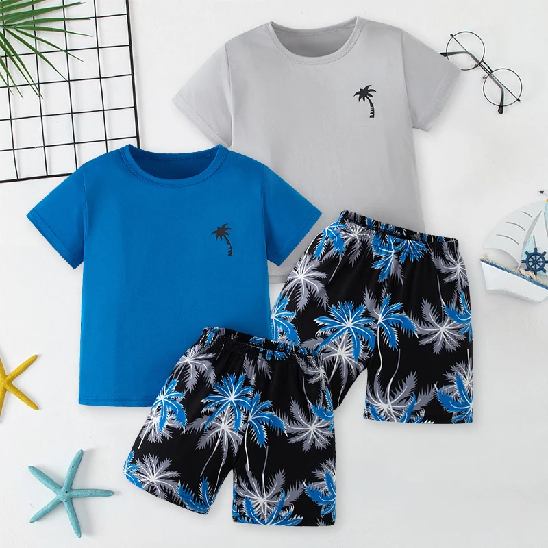 

Детский комплект из 2/4 предметов: летние спортивные шорты с принтом и короткими рукавами, модные футболка и брюки для мальчиков и девочек в отпускном стиле.