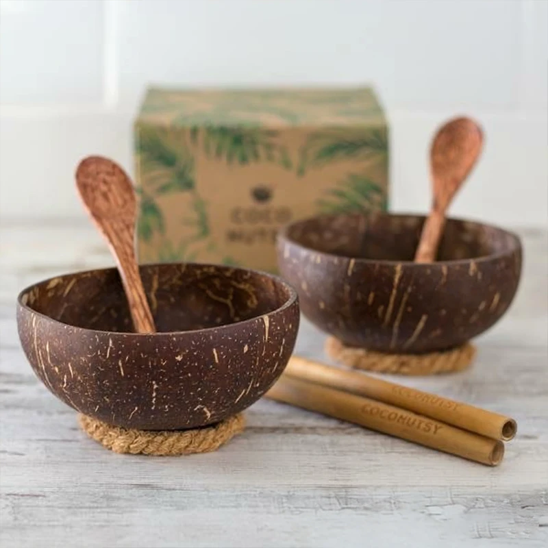 Nuevas cuencas de coco naturales hechas a mano, cuencas de coco de madera para comer, vajilla con tenedor y cuchara para postre, fruta, ensalada, arroz.