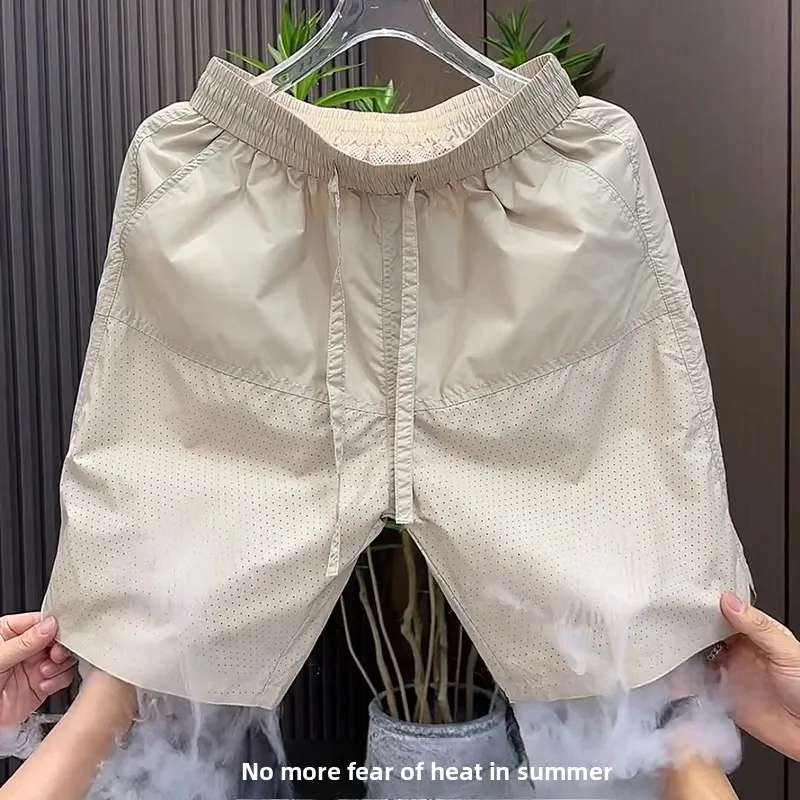 กางเกงลำลองผู้ชายผ้าบางระบายอากาศทรงหลวมใส่สบายสำหรับเล่นกีฬาหรือใส่ไปชายหาด ความยาวสี่ส่วนห้า ผ้า Me