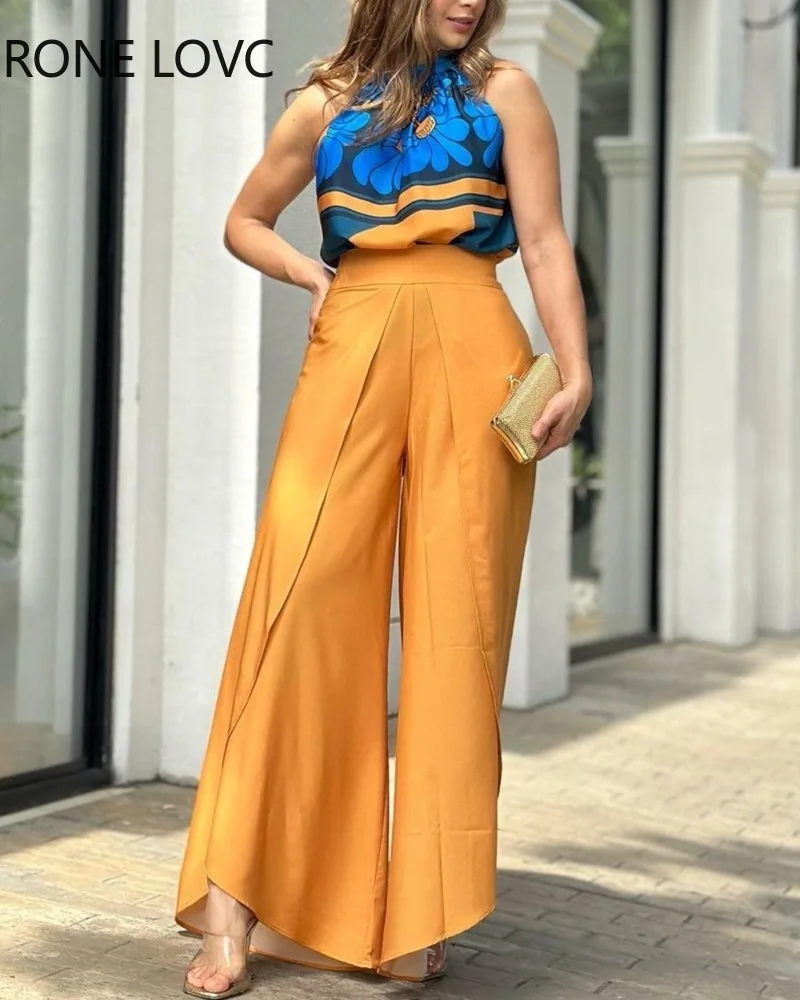 

Женский укороченный топ с лямкой на шее и Асимметричные однотонные брюки с прямыми штанинами