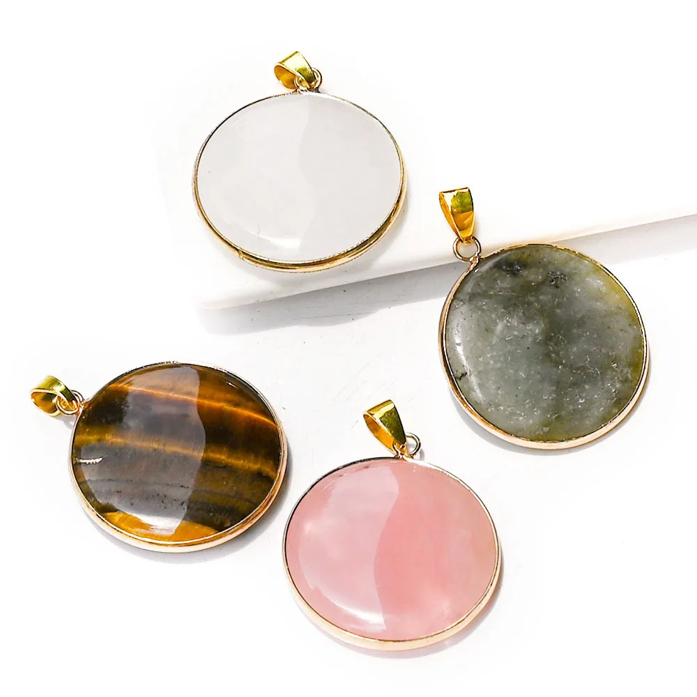 Natural crystal powder crystal round hemming pendant, elongated stone tiger's eye stone round cake bag, gold edge necklace penda