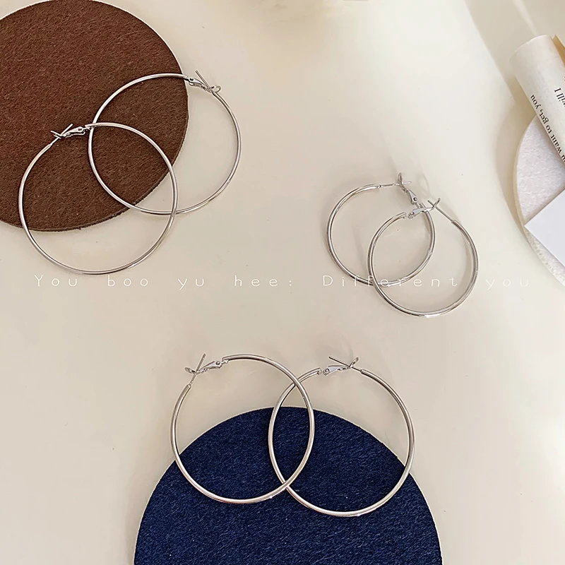 Statement Hoop Earrings for Women - High-End, Exaggerated Design, Perfect for Adding a Bold Touch to Any Outfit.