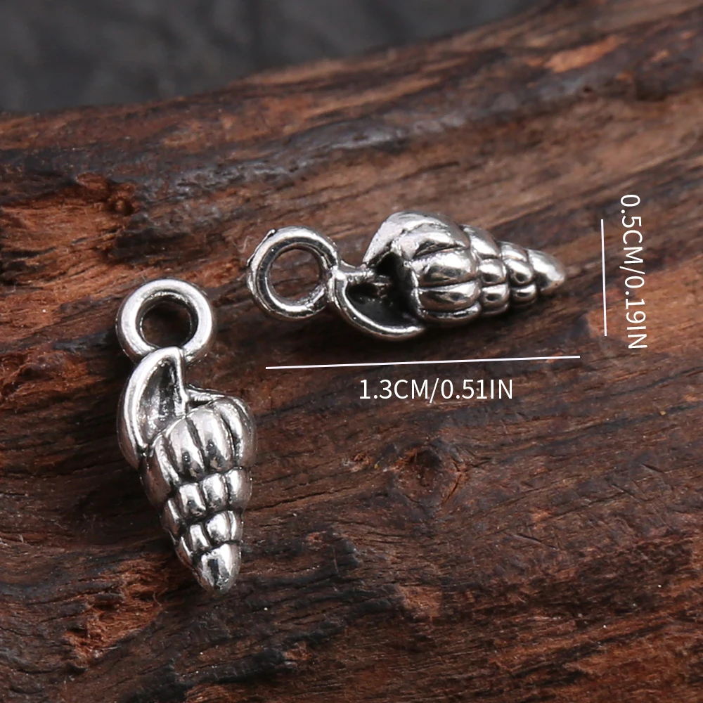 50 Mini Conch-Shaped DIY Handmade Pendants, with Spiral Texture That Replicates the Feel of Ocean Shells, Come with a Hanging Loop for Easy Attachment, Can Be Used to Make Bracelets, Necklaces, Key Pendants, and Seaside-Style Accessories Suitable for Summer Ocean-Themed Crafts view 6