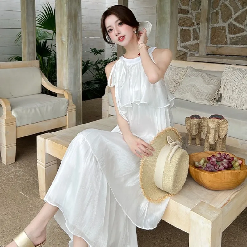 Vestido largo con cuello de temperamento francés para mujer, novedad de verano, vestido largo acampanado sin mangas con cuello redondo, vestido de vacaciones de Color sólido Fairycore