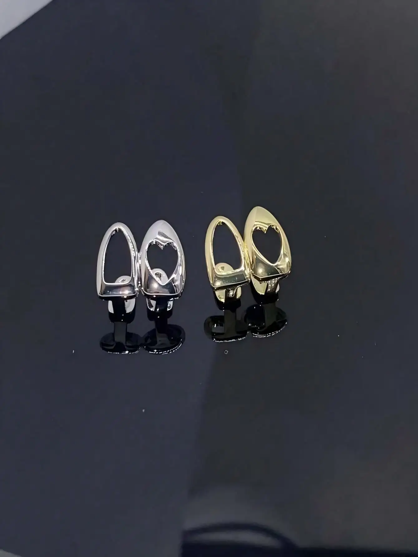 العناصر المشهورة: ديكورات أسنان الهيب هوب المجوفة على شكل قلب وإكسسوارات الحفلات وهدايا العطلات