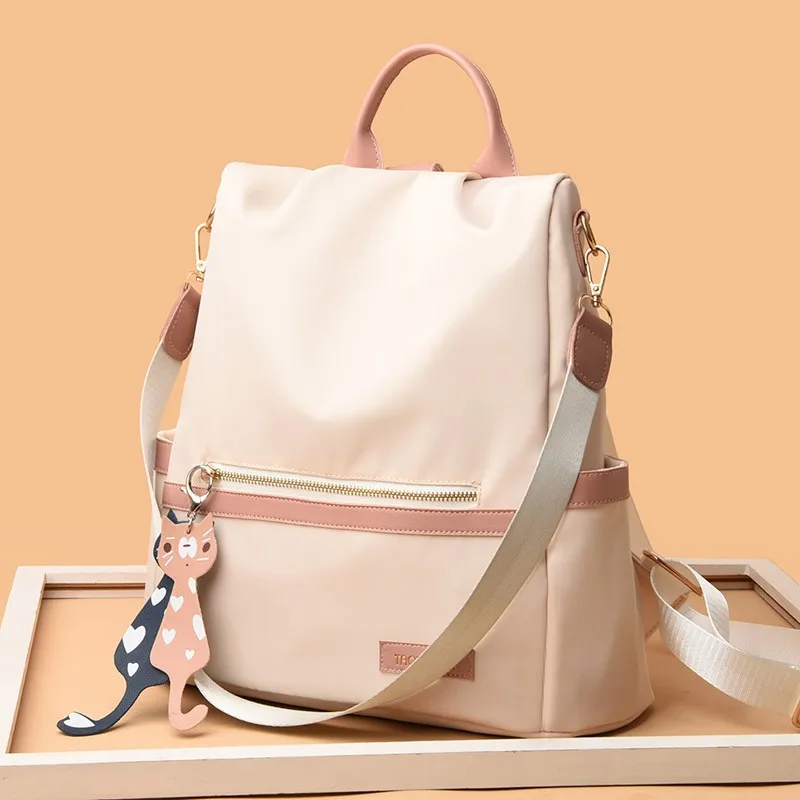 Women Anti Theft Backpack Purse Contrast Pink Trim Nylon Travel Daypack with Cute Cat Pendant Multi Pockets Convertible Shoulder