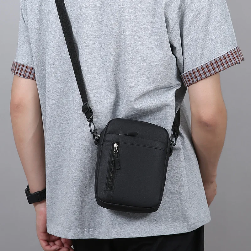 حقيبة كتف كاجوال للرجال، حقيبة ساعي عصرية مضادة للرش من النايلون، حقيبة هاتف محمول خفيفة وبسيطة للسفر في الأعمال