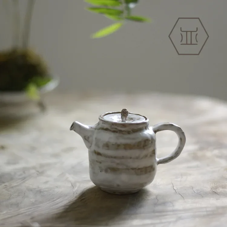 Coarse pottery hand-clawed teapot, Kung Fu tea set, brewing teapot hand-held pot printing, Zen ceramic Japanese-style small brew