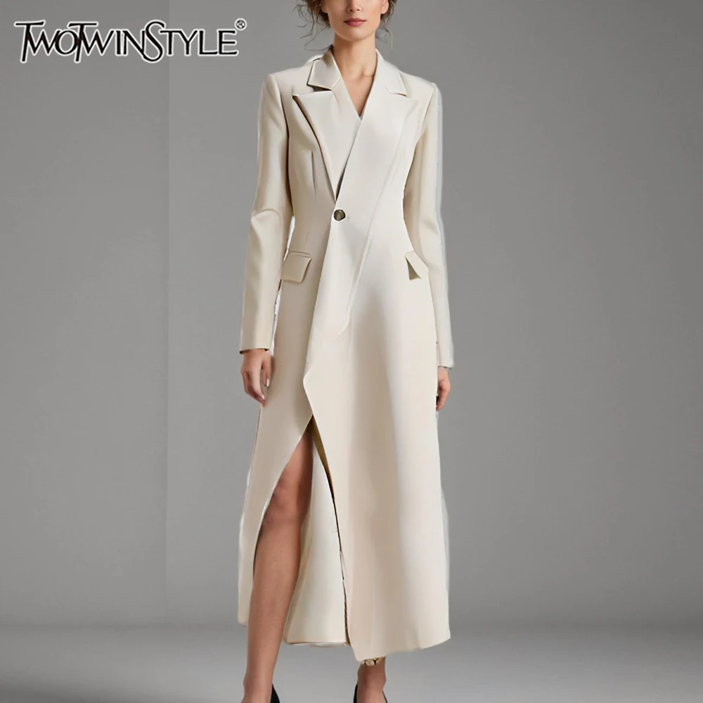 TWOTWINSTYLE Spliced Pockets Irregular Trench For Women Lapel Long Sleeve Tunic Patchwork Button Temperament Coats Female New