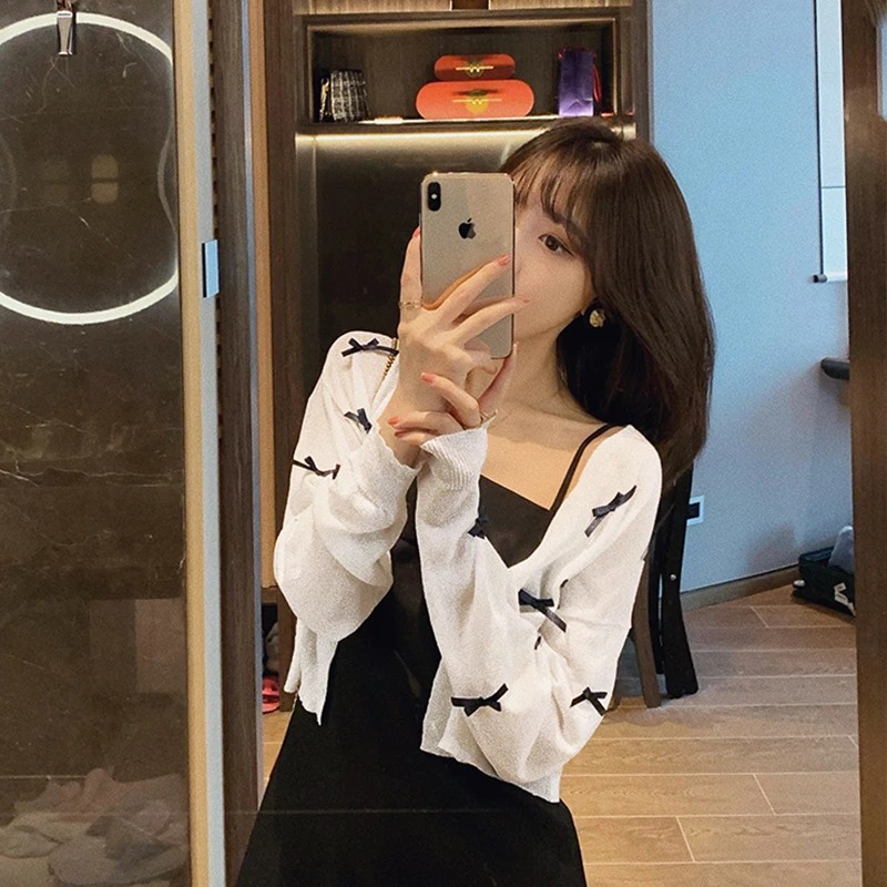 

Женская вязаная короткая верхняя одежда с длинным рукавом для защиты от солнца, весна-осень-лето, новый стиль, V-образный вырез, на пуговицах, цвет баттер.