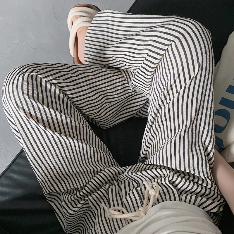 سراويل نسائية طويلة مخططة جديدة مستقيمة واسعة الساق للربيع والصيف سراويل رياضية طويلة فضفاضة سراويل مناسبة للإناث