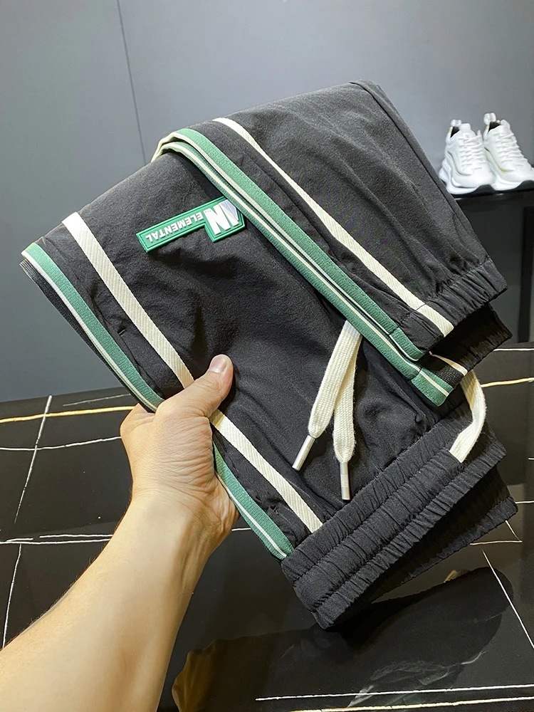 

Мужские ультратонкие повседневные брюки из ледяного шелка, модные, с завязками, облегающие, спортивные, быстросохнущие, летние, в стиле кэжуал