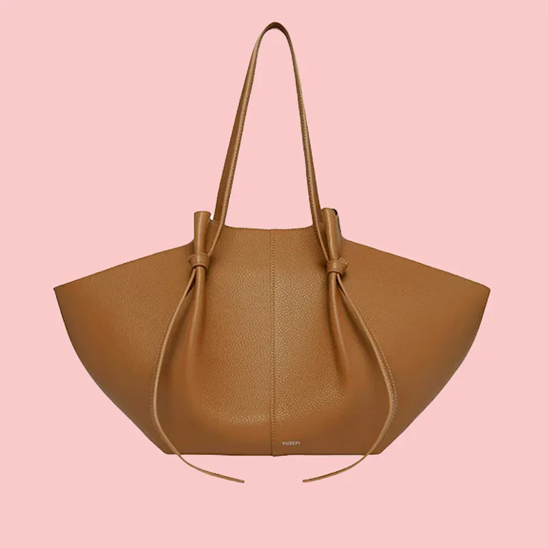 

Cowhide women's handbag luxury designer tote bag, retro large capacity single shoulder wing bag