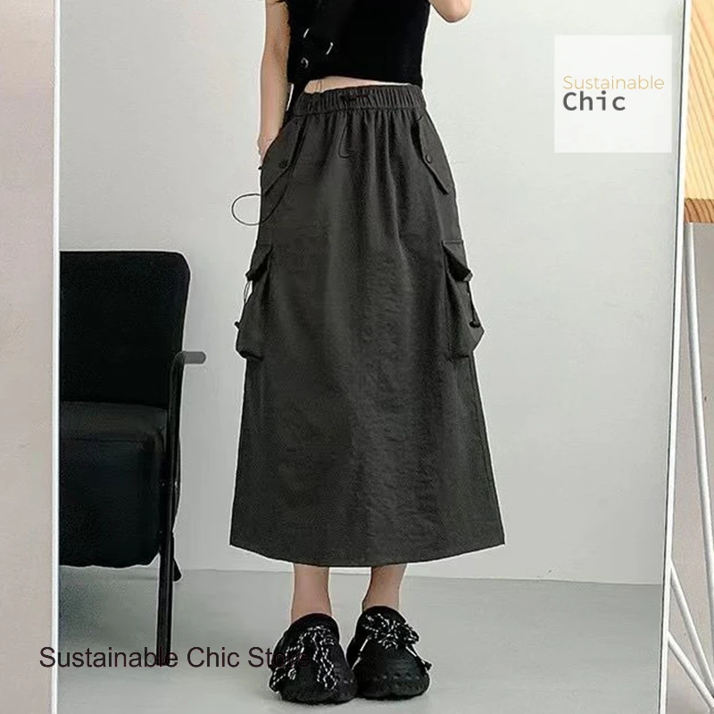 

American retro drawstring frock skirt women's summer new high waist fashion temperament slim long Joker thin gray A-line skirt.