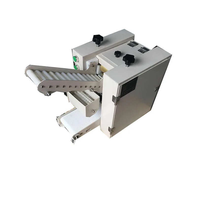 

Commercial new automatic anti-handmade dumpling skin machine, small rolling and pressing machine