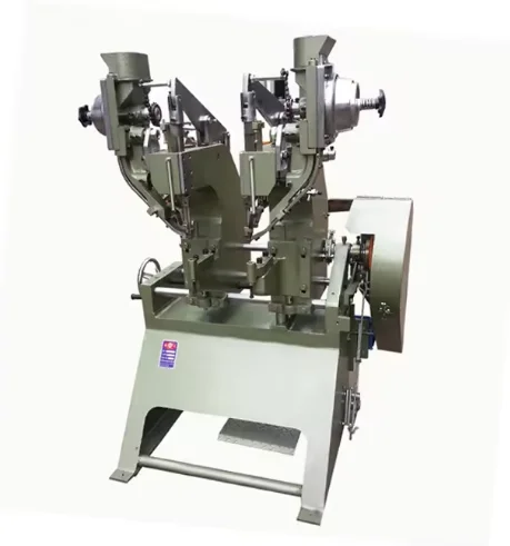 Electric double-head riveting machine with automatic feed folder for producing double rivets