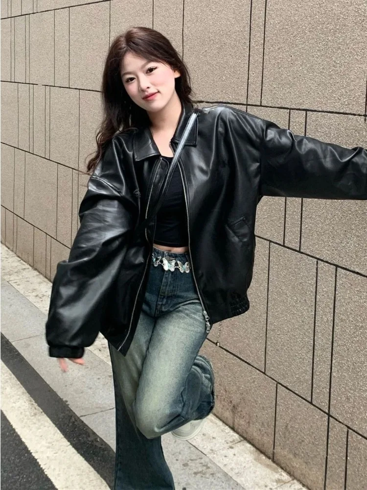 블랙 폴로 칼라 가죽 자켓 여성을위한 하이 엔드 롱 가죽 코트 한국 스타일 느슨하고 세련된 가죽 자켓