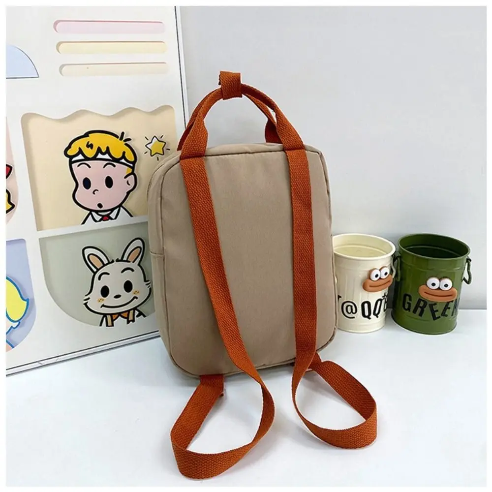 New Embroidery Sun Long Neck Small Dinosaur Backpack Hook Hair Embroidered Cartoon Canvas Kindergarten Children Backpack view 3
