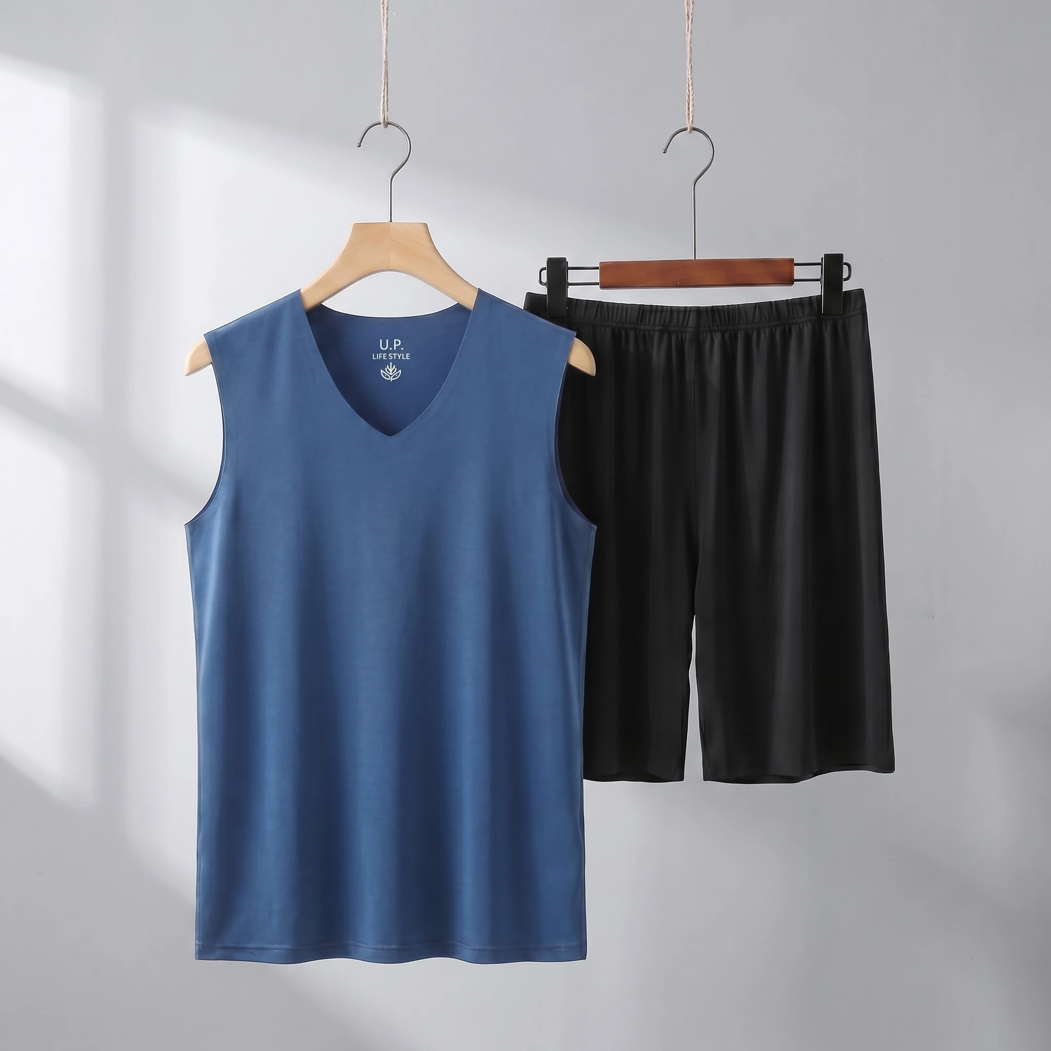 Dark blue vest + black shorts